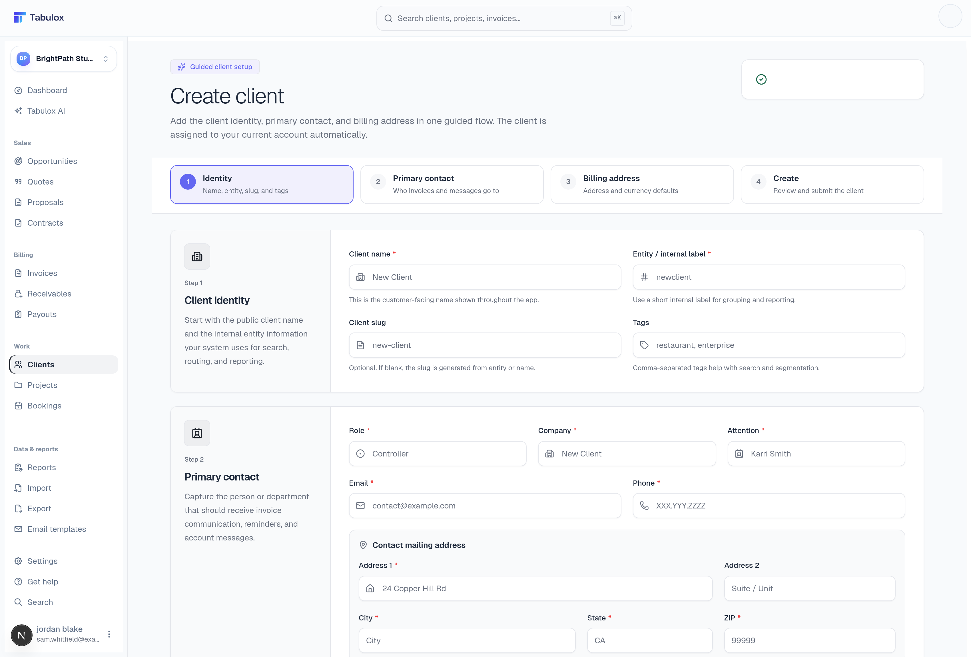 Guided client setup wizard on the Identity step, with the Primary contact step's fields visible below it